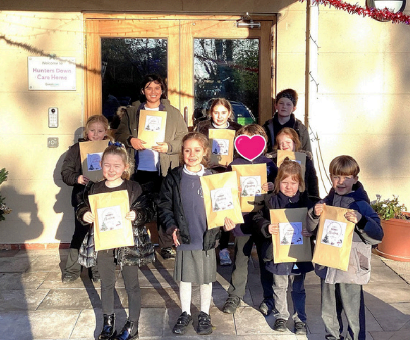 Hartford pupils spread Christmas cheer at local care home